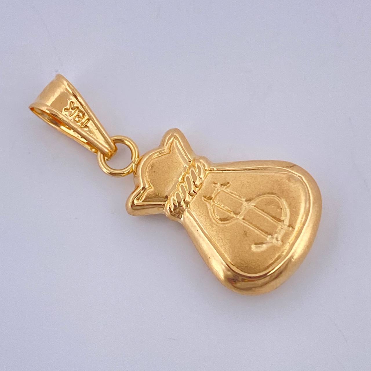 Dije Bolsa De Dinero 1.2gr / 3cm / Oro Amarillo 18K $