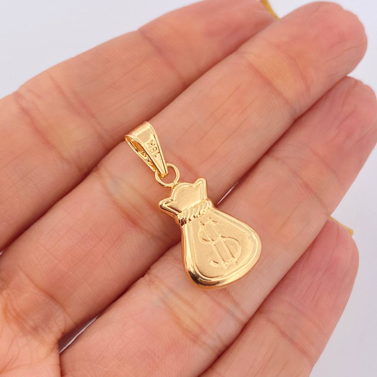 Dije Bolsa De Dinero 1.2gr / 3cm / Oro Amarillo 18K $