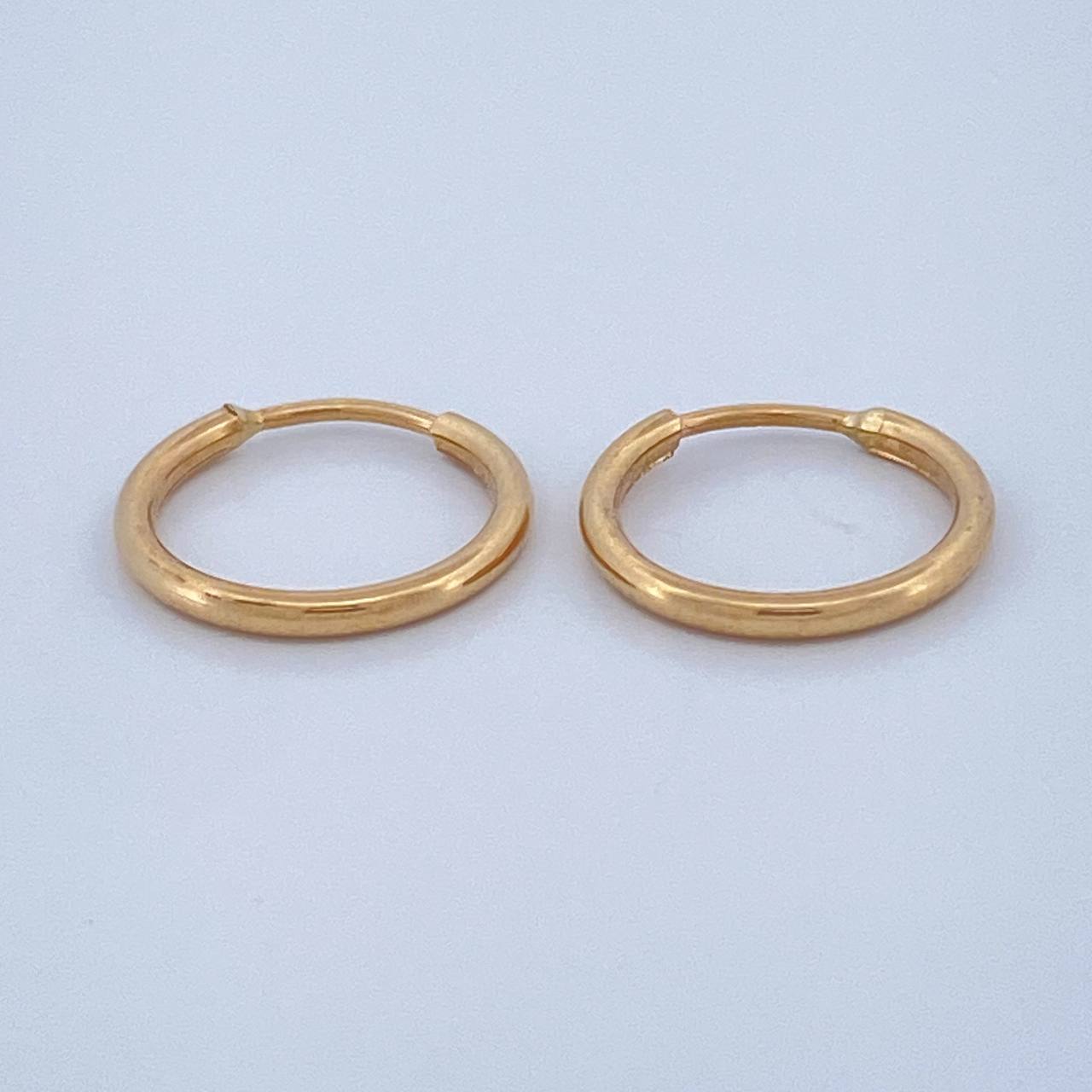 Candongas Aro Liso 0.55gr / 1cm / Oro Amarillo 18K $