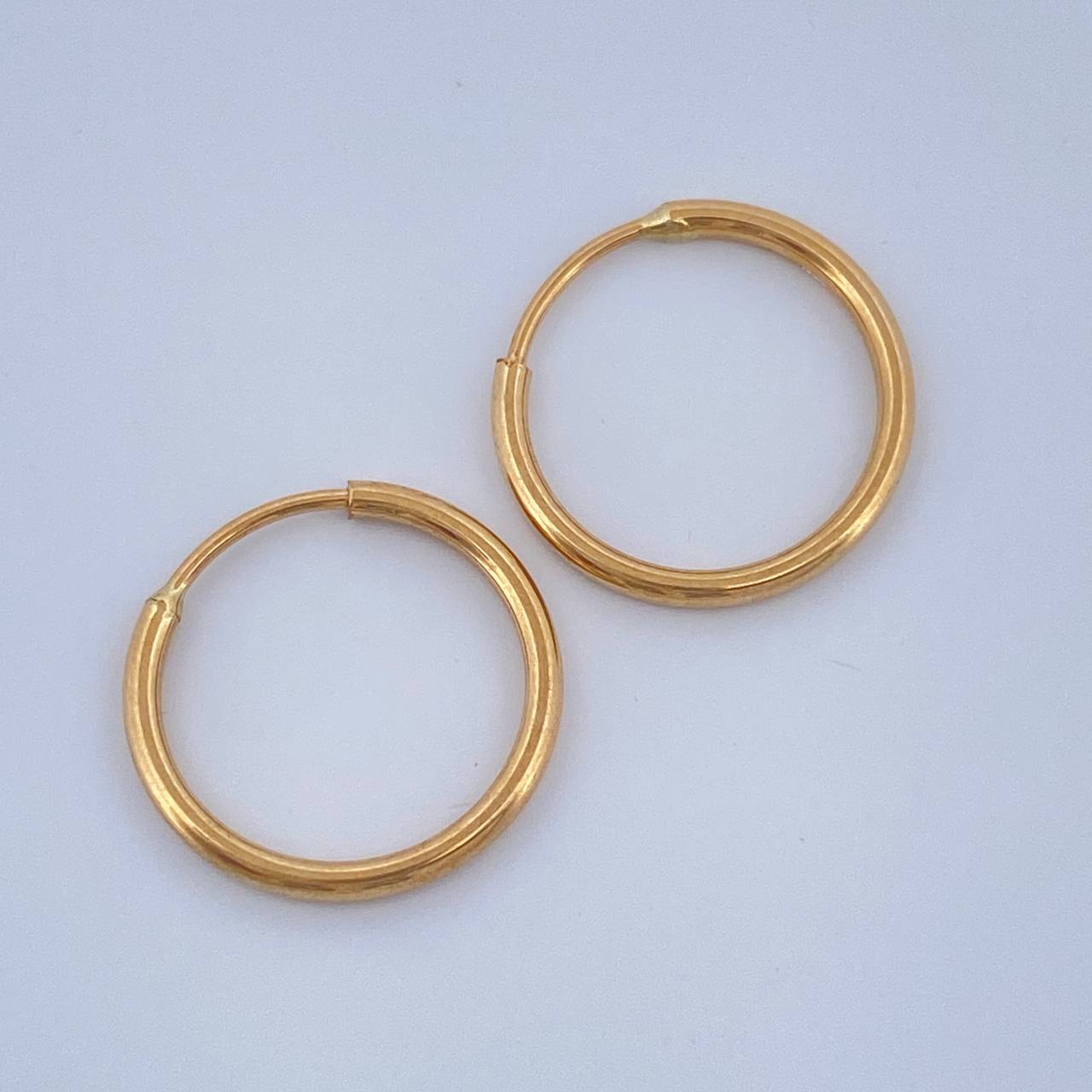 Candongas Aro Liso 0.65gr / 1.4cm / Oro Amarillo 18K $