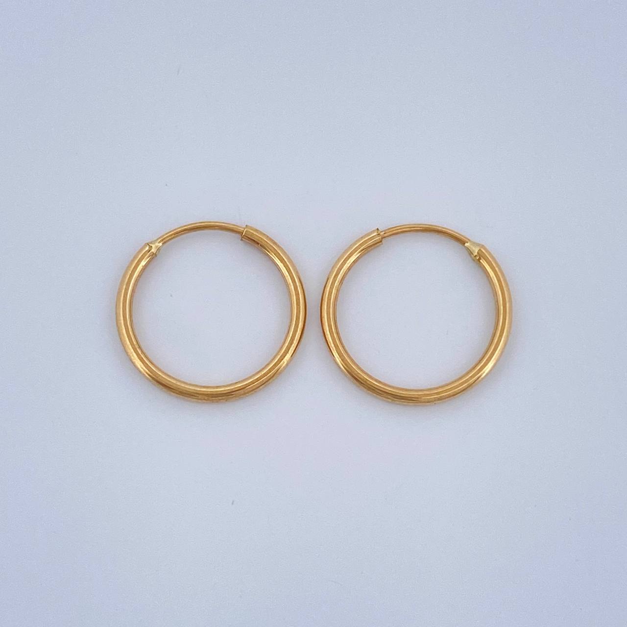 Candongas Aro Liso 0.65gr / 1.4cm / Oro Amarillo 18K $