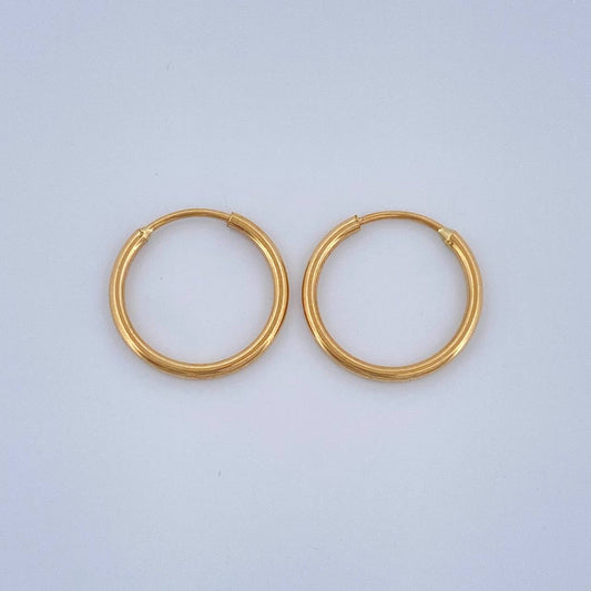 Candongas Aro Liso 0.65gr / 1.4cm / Oro Amarillo 18K $