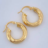 Candongas Bouclé 2.65gr / 2cm / Oro Amarillo 18K $