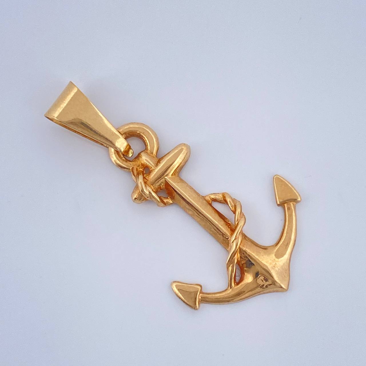 Dije Ancla Cadena 1.4gr / 3.1cm / Oro Amarillo 18K $