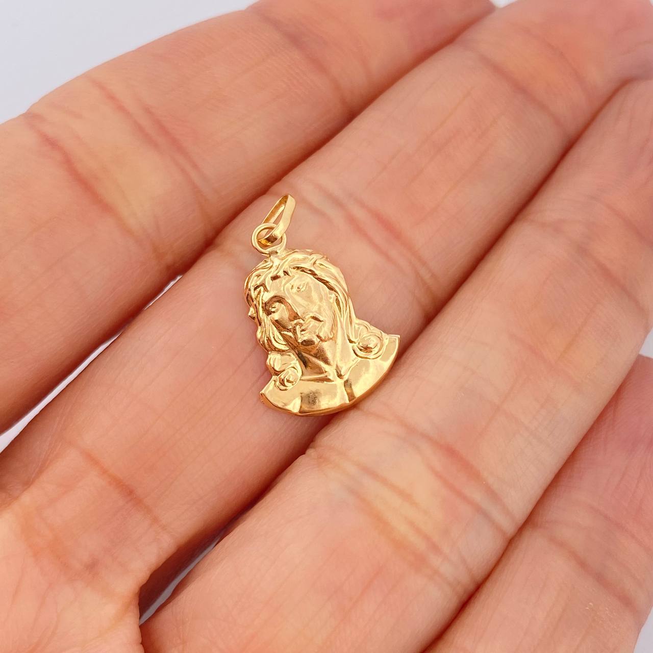 Dije Rostro Cristo 0.75gr / 2.1cm / Oro Amarillo 18K $