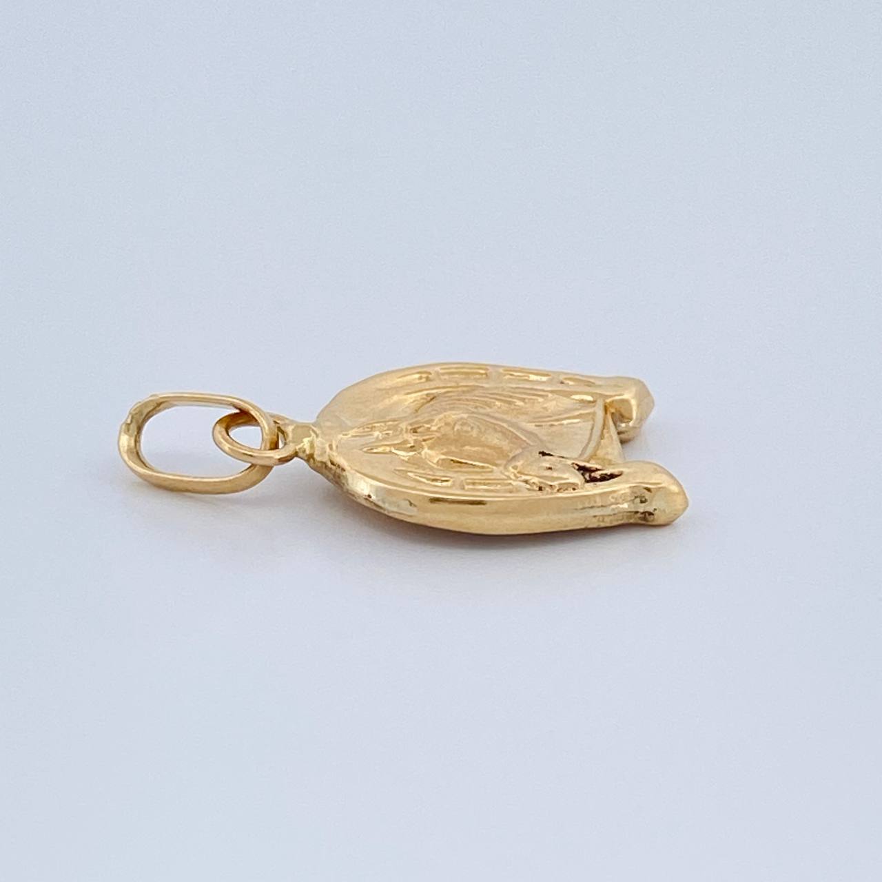 Dije Herradura Caballo 0.65gr / 2cm / Oro Amarillo 18K $