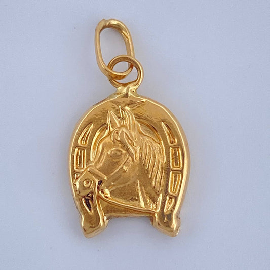 Dije Herradura Caballo 0.65gr / 2cm / Oro Amarillo 18K $