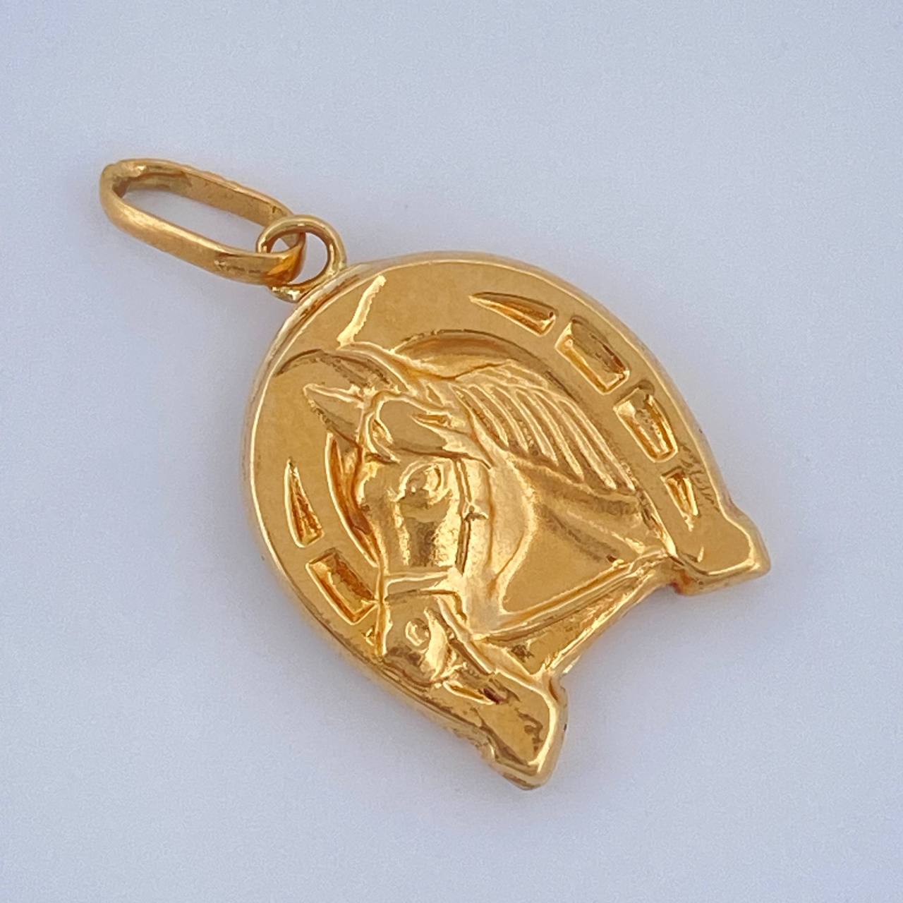 Dije Herradura Caballo 1.05gr / 2.5cm / Oro Amarillo 18K $