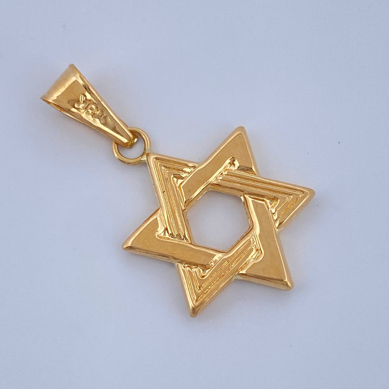 Dije Estrella De David 1.1gr / 2.8cm / Oro Amarillo 18K $