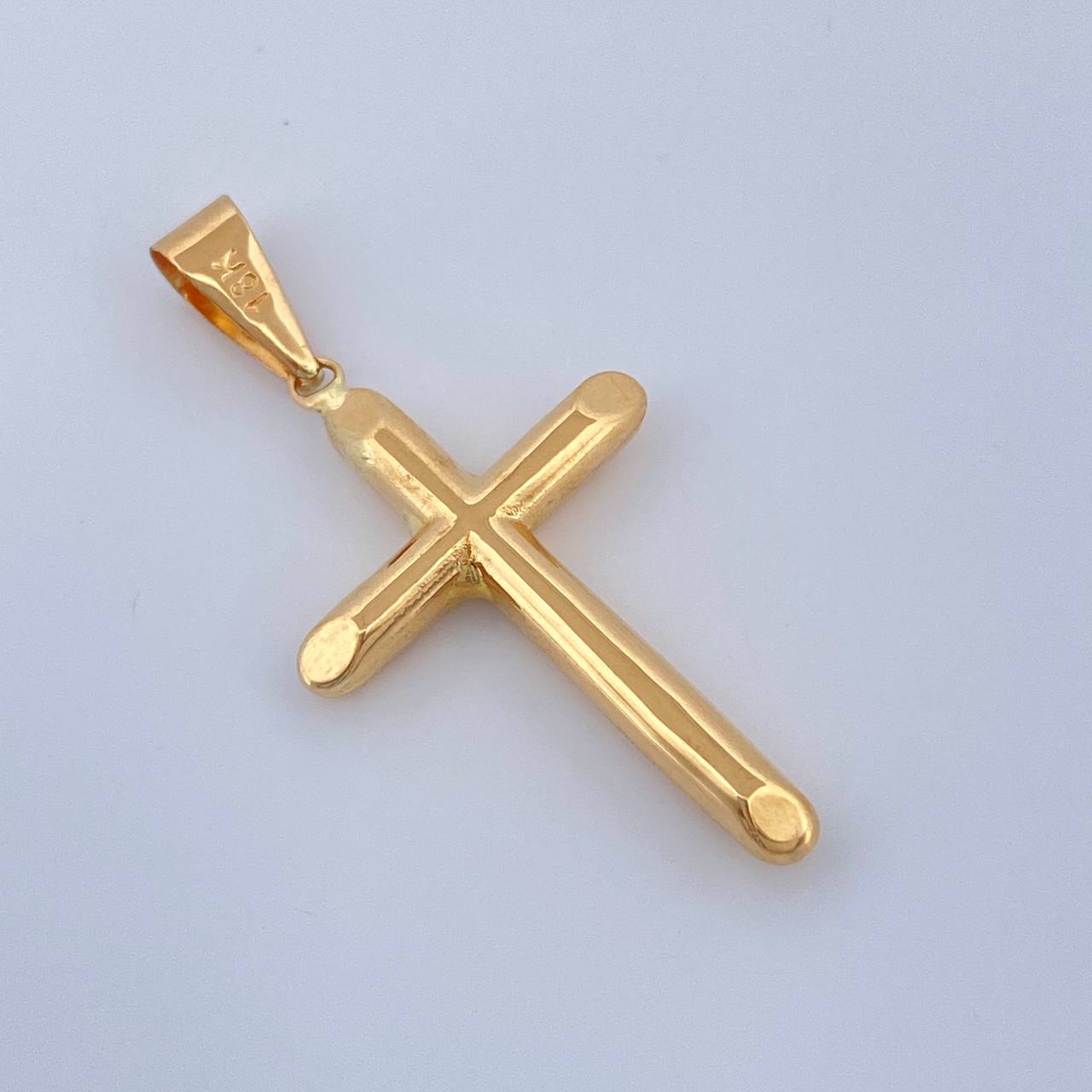 Dije Cruz 1.35gr / 4.2cm / Oro Amarillo 18K $