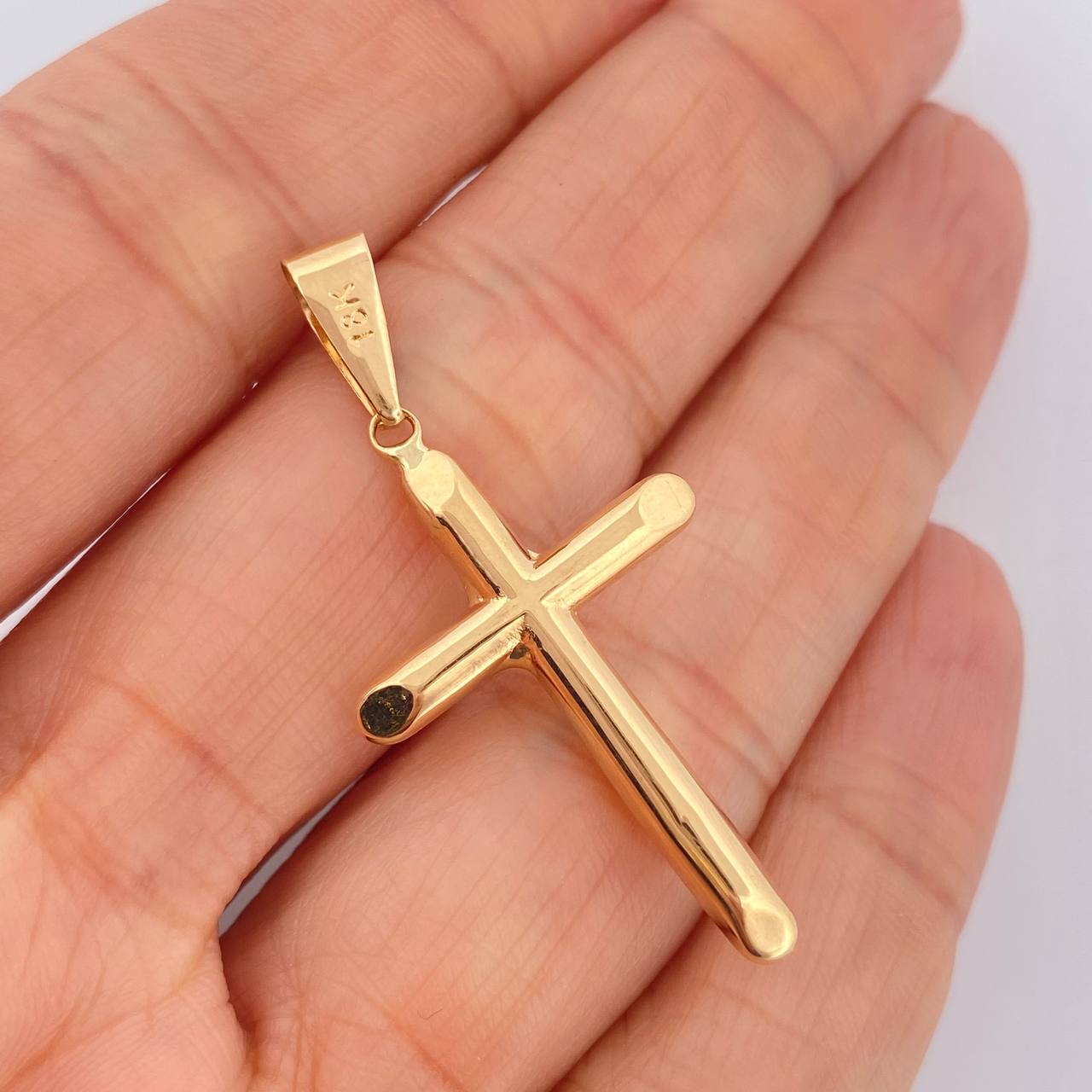 Dije Cruz 0.85gr / 3.5cm / Oro Amarillo 18K $
