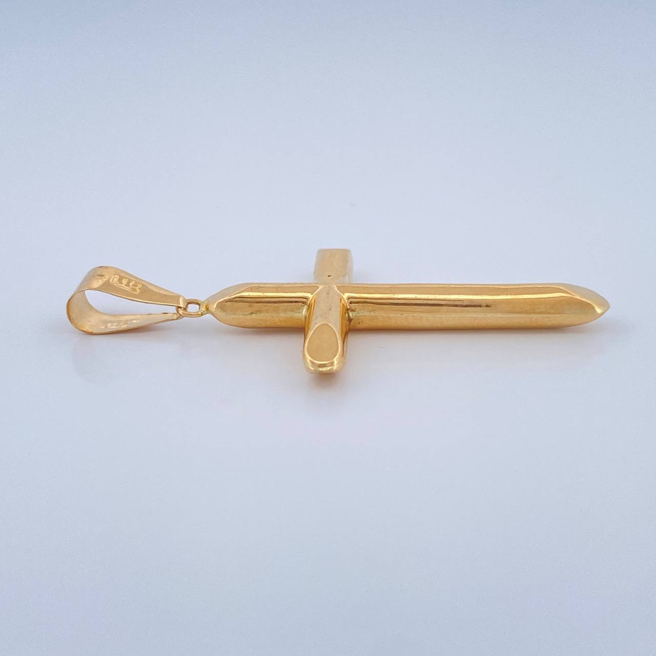 Dije Cruz 1.6gr / 4.6cm / Oro Amarillo 18K $