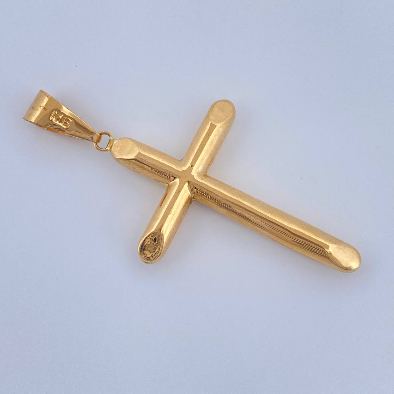 Dije Cruz 1.6gr / 4.6cm / Oro Amarillo 18K $