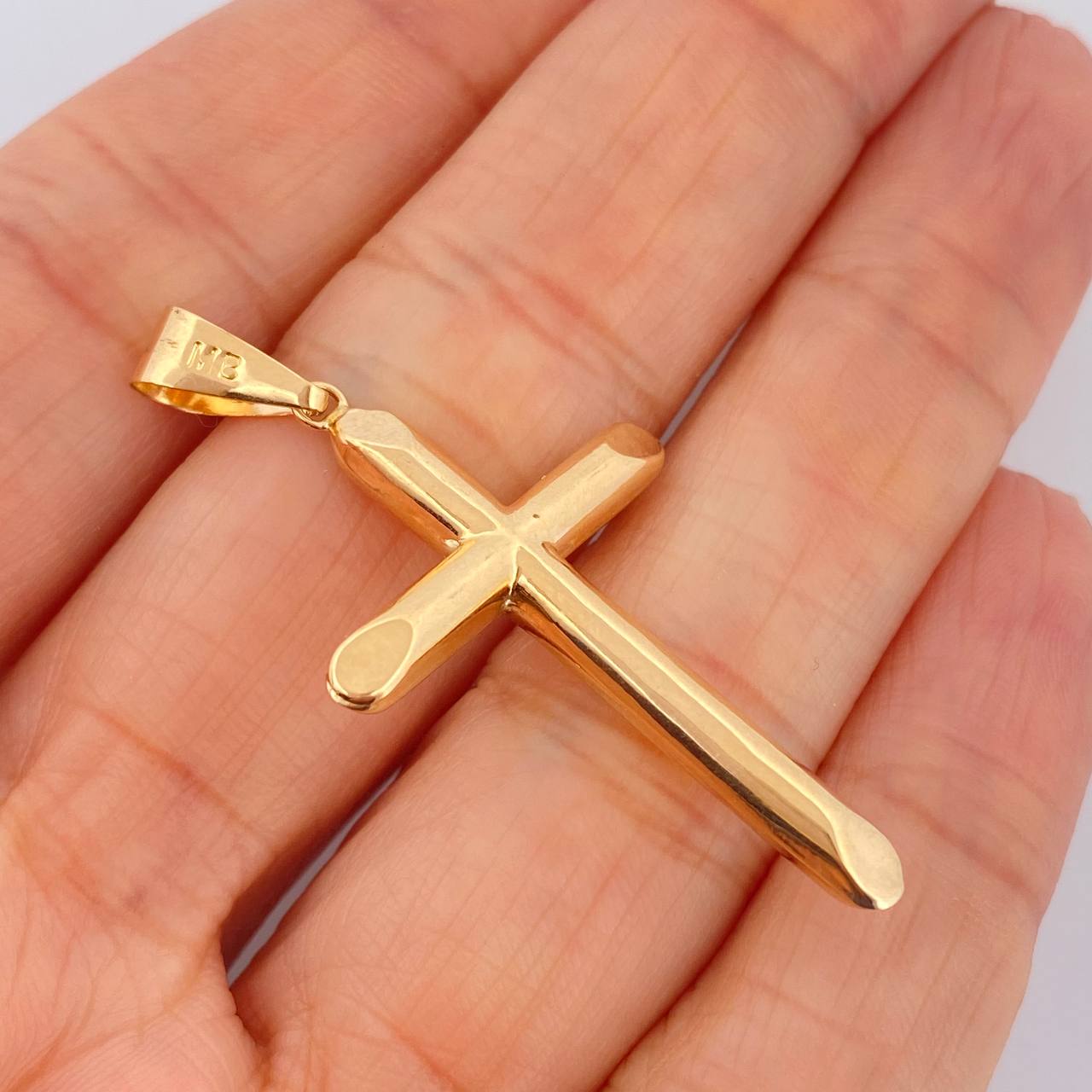 Dije Cruz 1.6gr / 4.6cm / Oro Amarillo 18K $