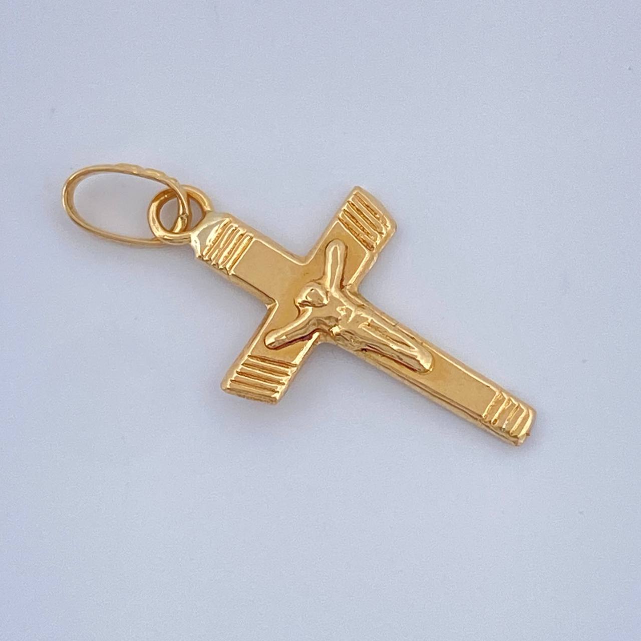 Dije Cruz Cristo 0.35gr / 2.1cm / Oro Amarillo 18K $