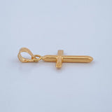 Dije Cruz 0.4gr / 2.3cm / Oro Amarillo 18K $