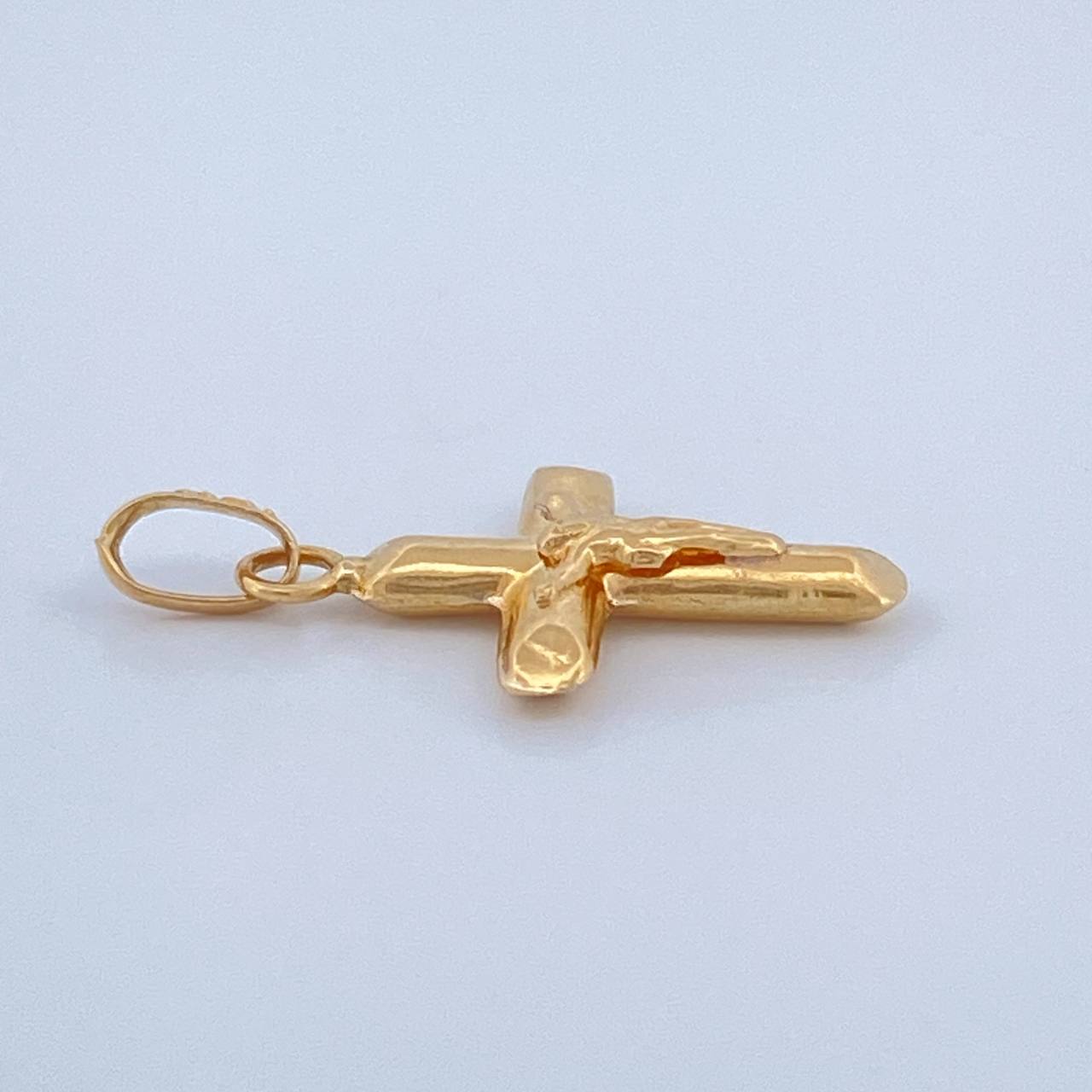 Dije Cruz Cristo 0.45gr / 2cm / Oro Amarillo 18K $