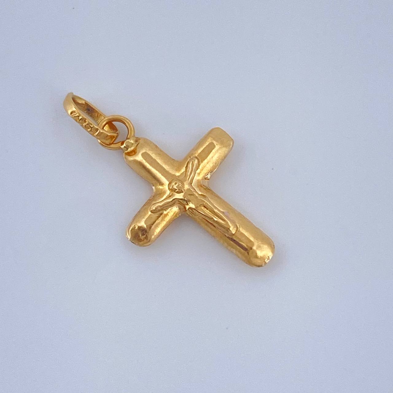 Dije Cruz Cristo 0.45gr / 2cm / Oro Amarillo 18K $