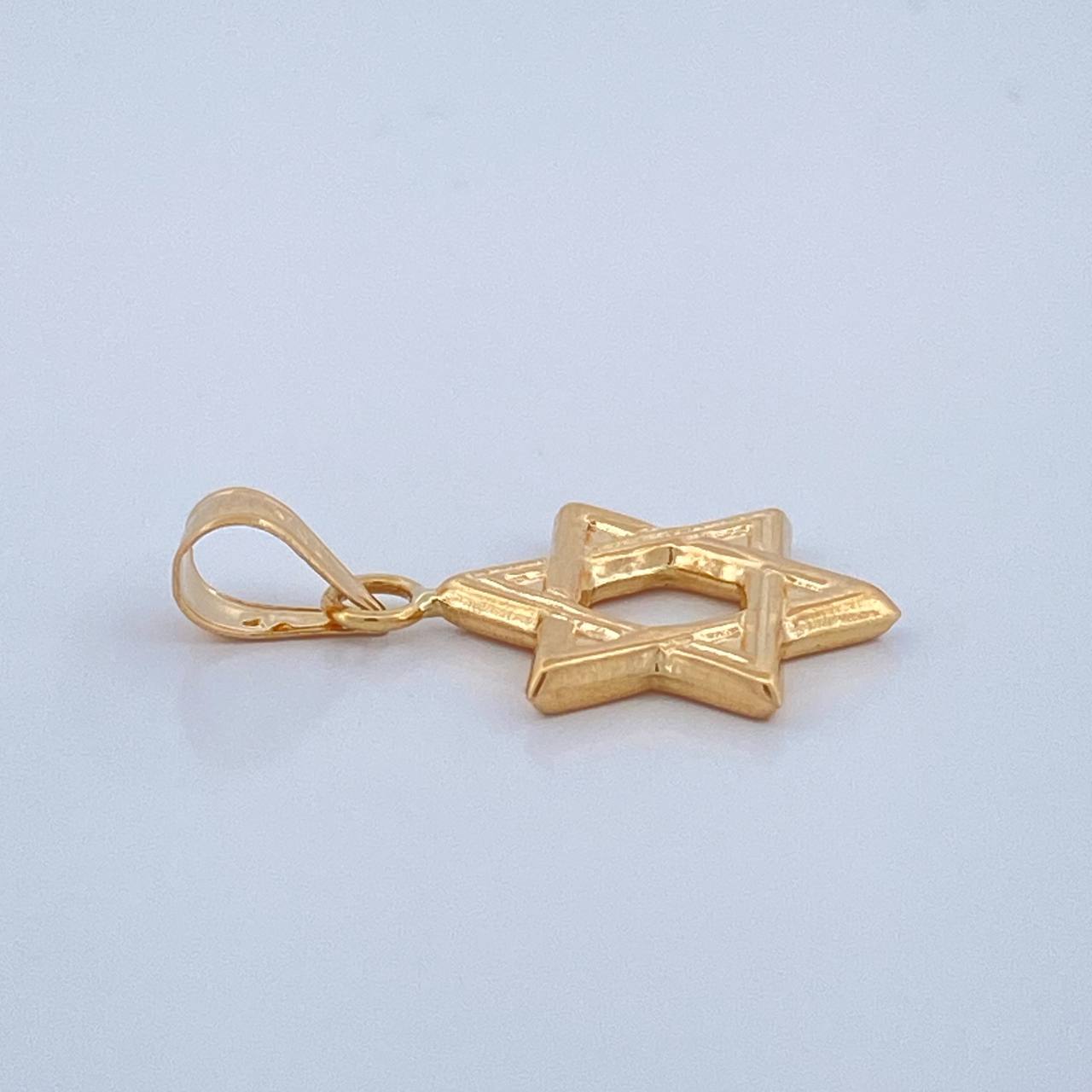 Dije Estrella De David 0.55gr / 2cm / Oro Amarillo 18K $