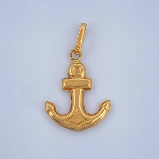 Dije Ancla 0.7gr / 2.4cm / Oro Amarillo 18K $