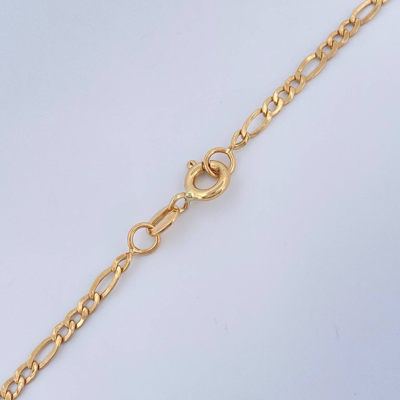 Cadena Figaro 3.8gr / 62cm / 2.5mm Oro Amarillo +1 18K %