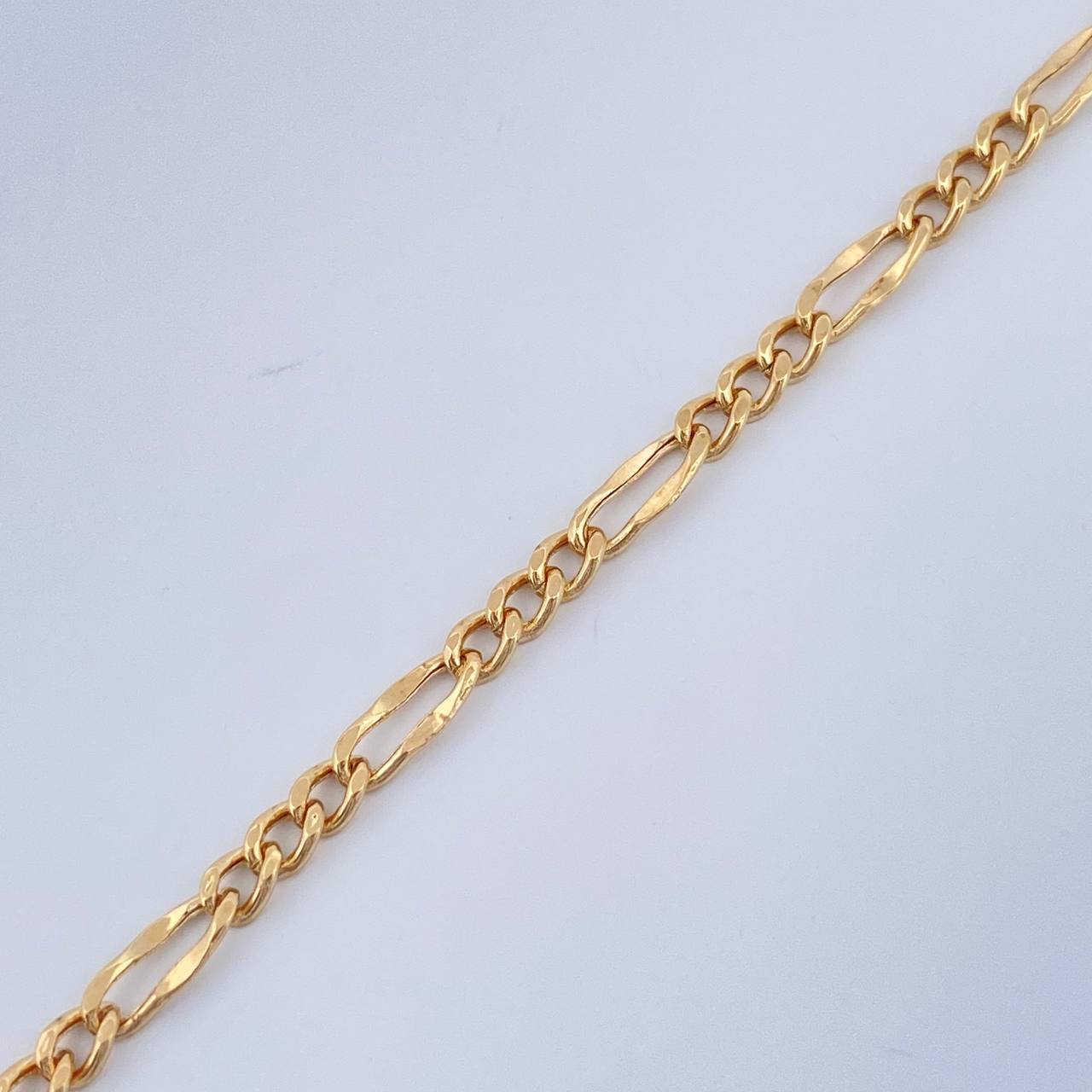 Pulso Figaro 1.25gr / 19cm / 2.32mm Oro Amarillo +1 18K %