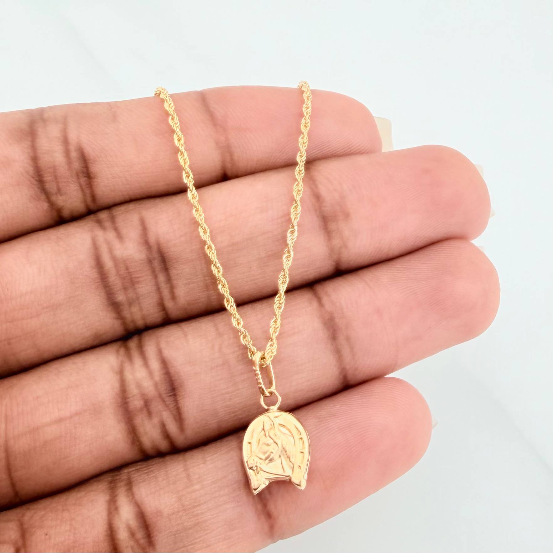 Set Cadena Lazo + Dije Herradura Caballo / 1.7gr / 60.1 cm Oro Amarillo 18K
