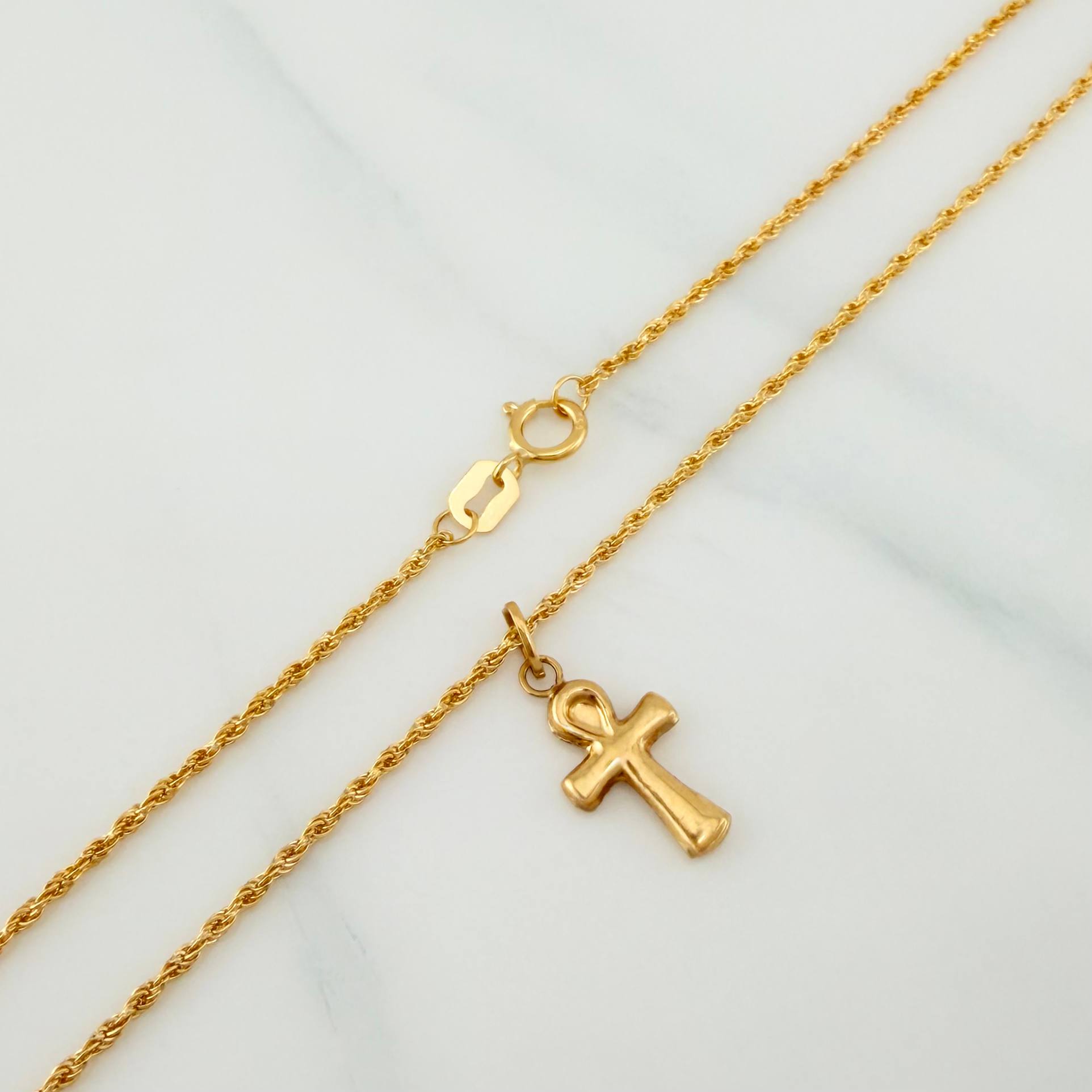 Set Cadena Lazo + Dije Cruz / 1.5gr / 60 cm Oro Amarillo 18K