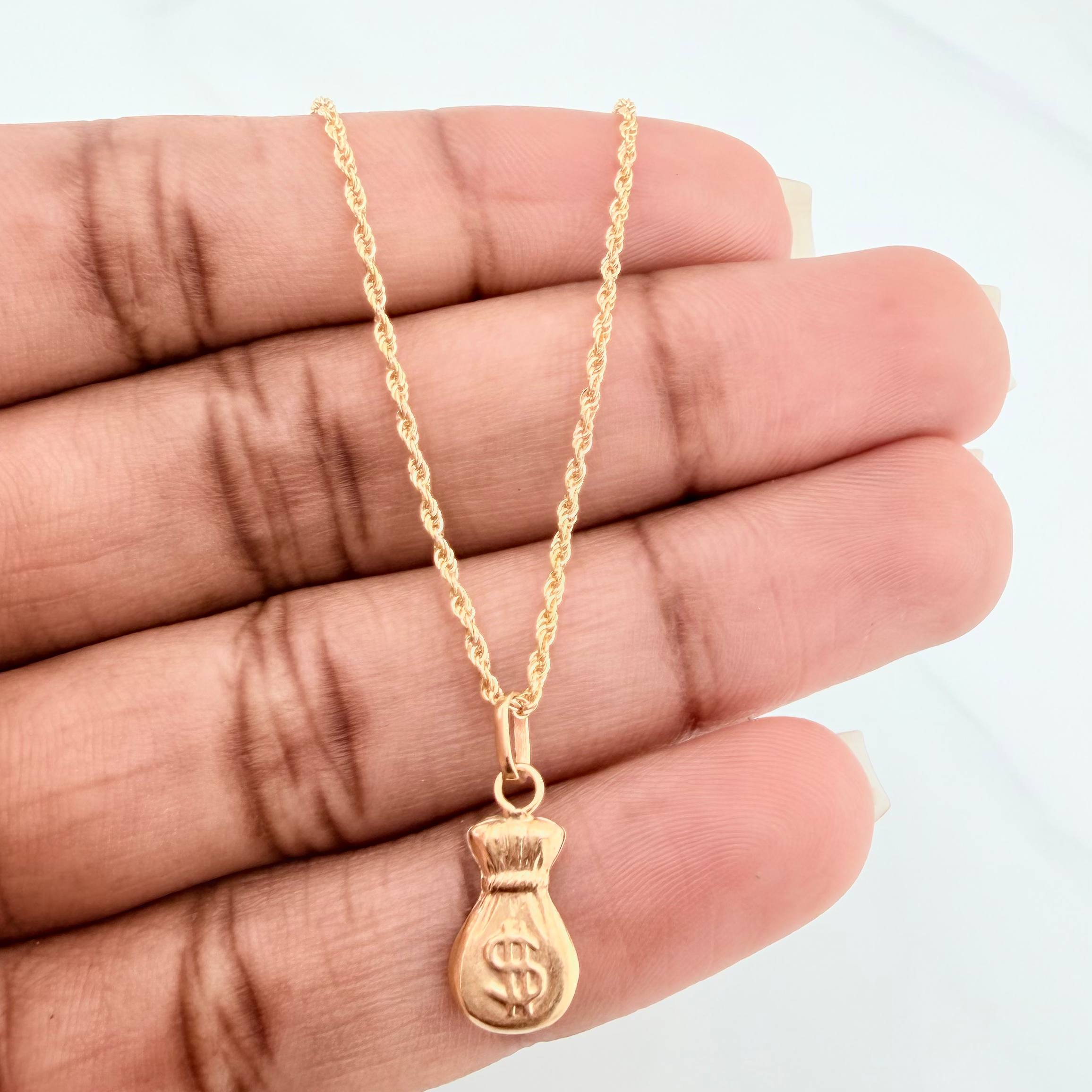 Set Cadena Lazo + Dije Bolsa Dinero / 1.6gr / 59.5 cm Oro Amarillo 18K