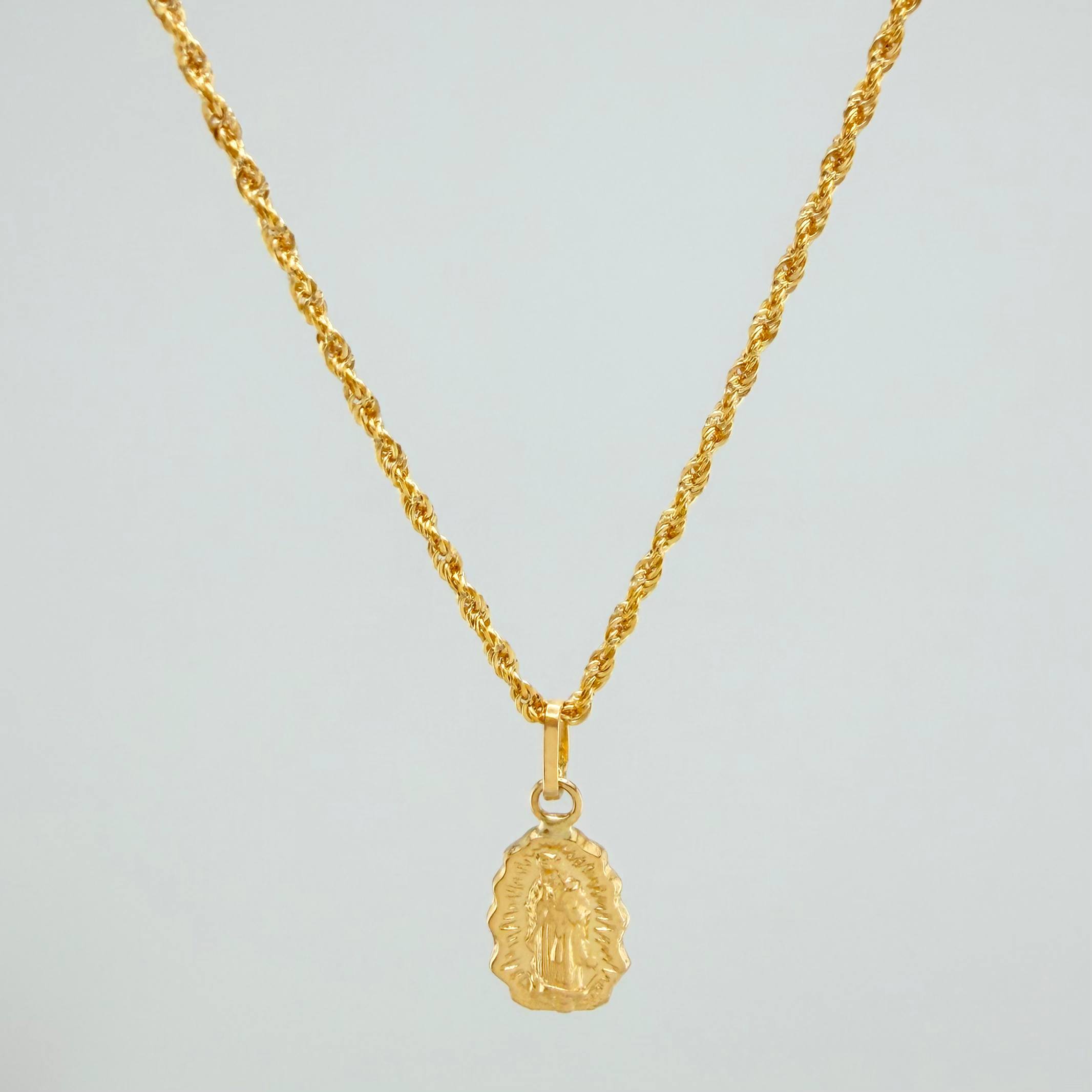 Set Cadena Lazo + Dije Virgen Guadalupe / 1.5gr / 49.5 cm Oro Amarillo 18K