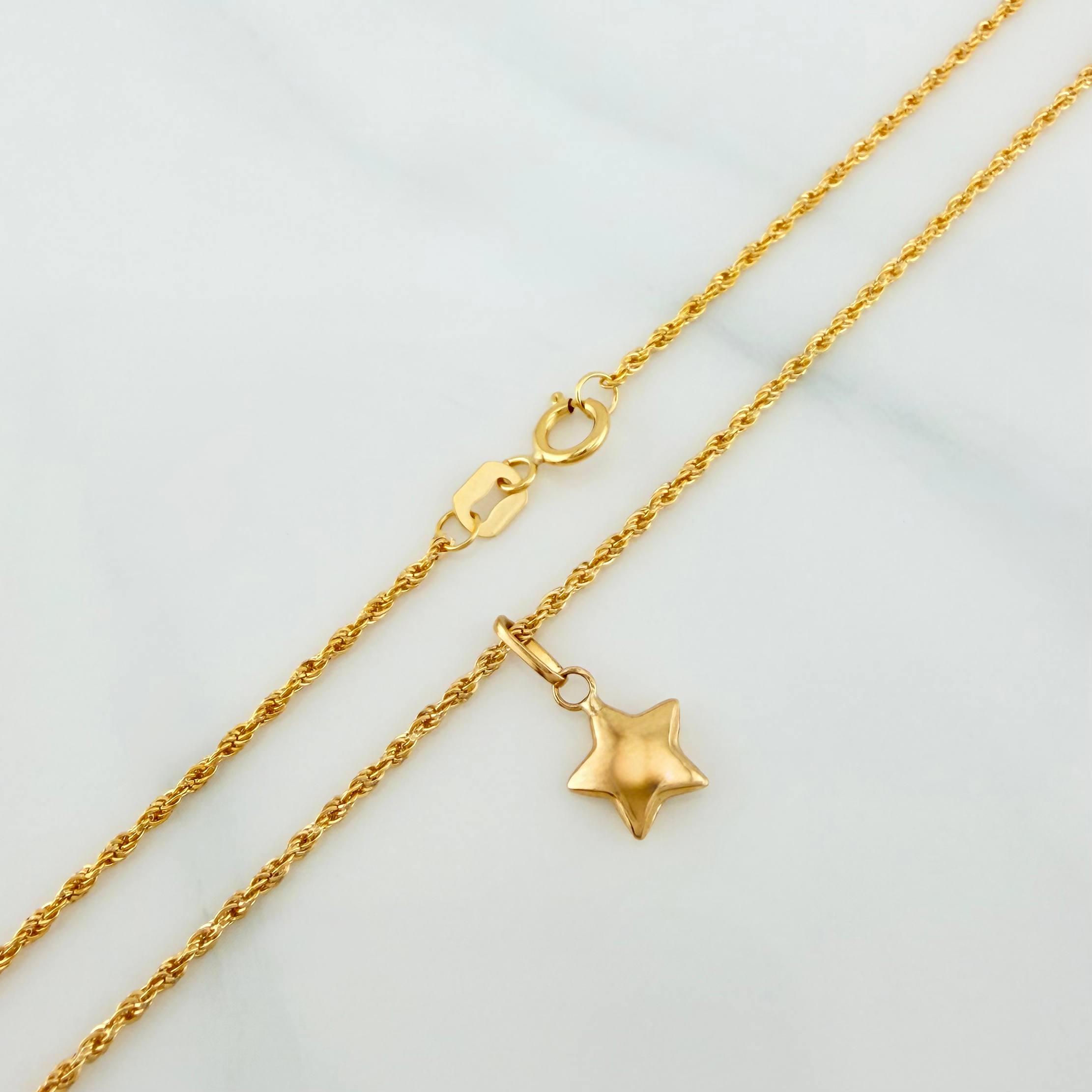 Set Cadena Lazo + Dije Estrella / 1.3gr / 49.9 cm Oro Amarillo 18K