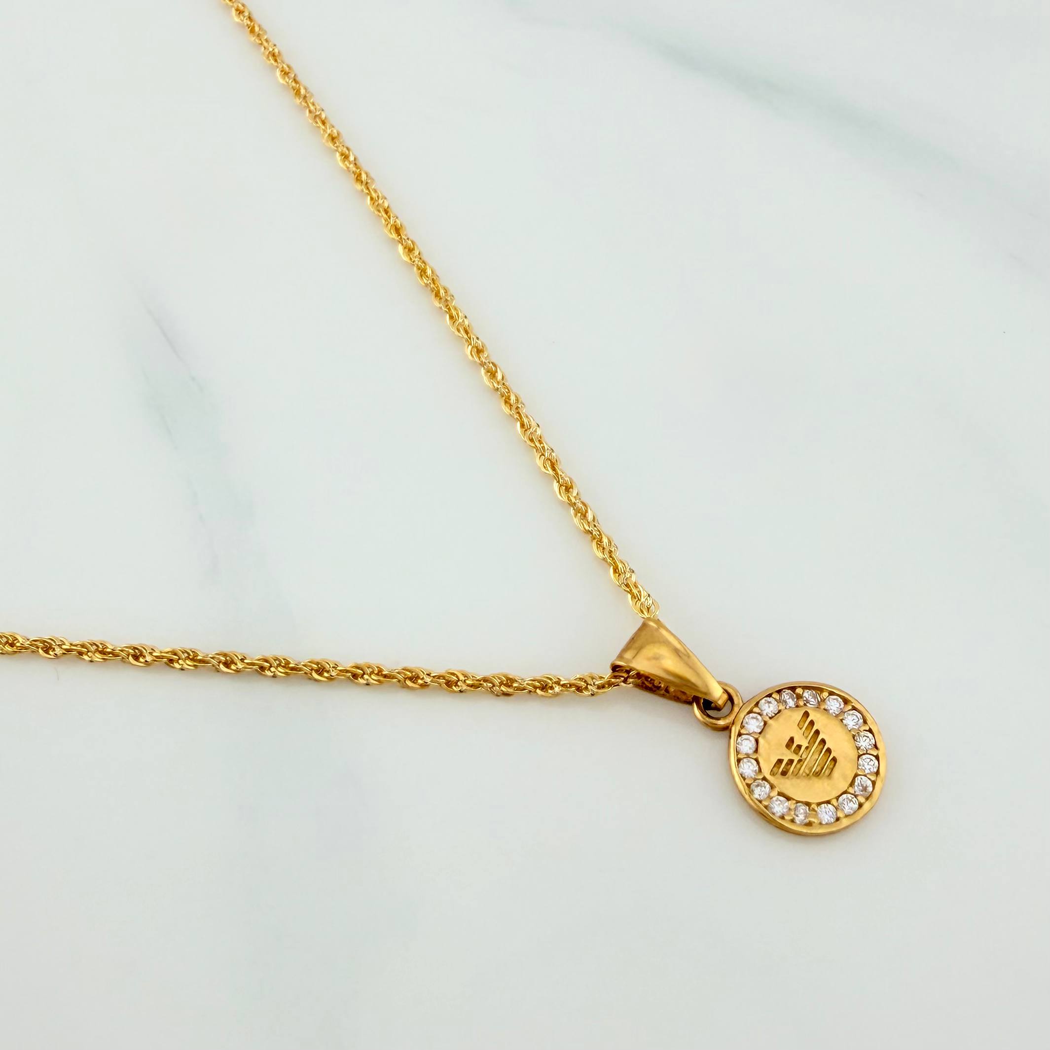 Set Cadena Lazo + Dije Emporio / 1.65gr / 50 cm Oro Amarillo 18K