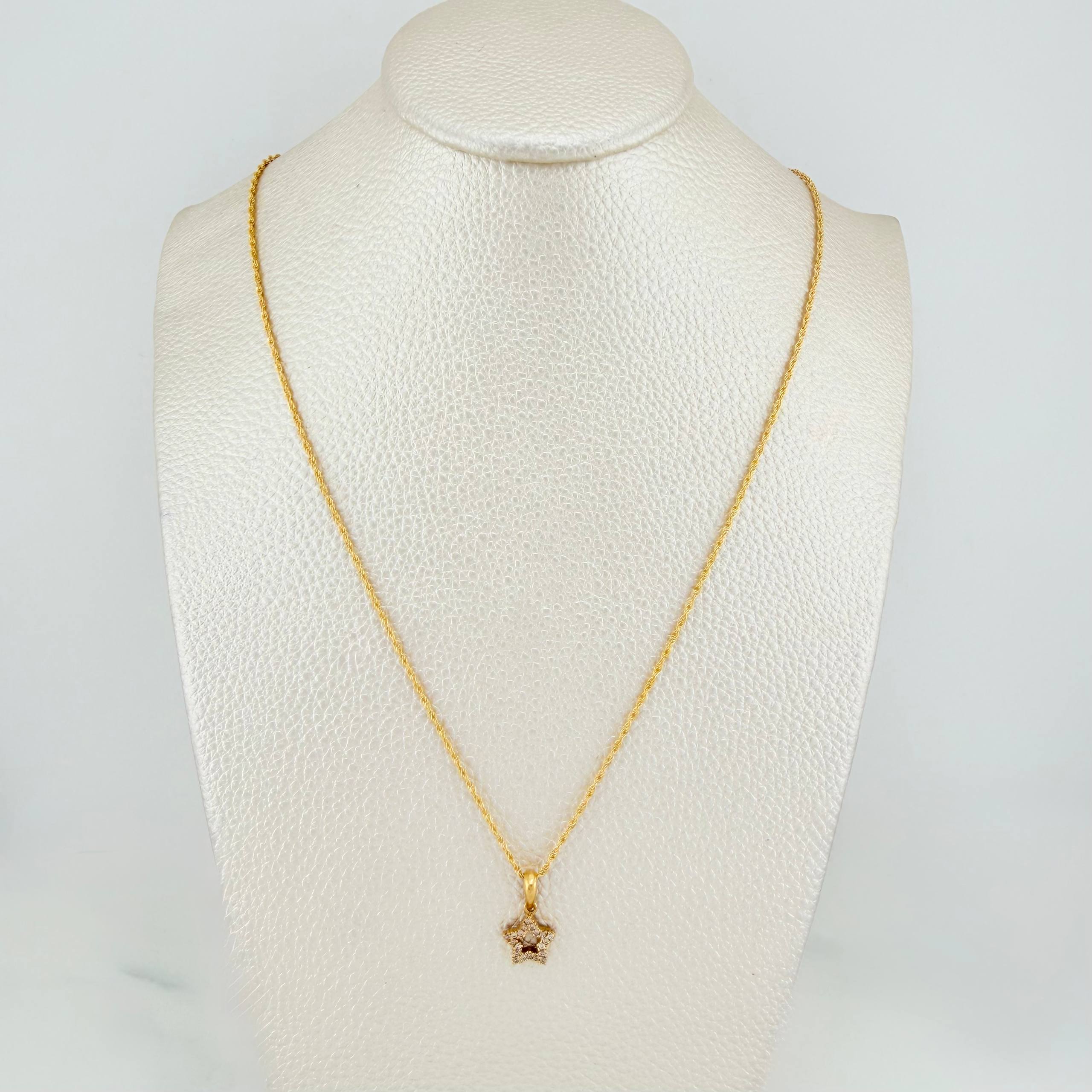 Set Cadena Lazo + Dije Silueta Estrella / 1.7gr / 50 cm Oro Amarillo 18K
