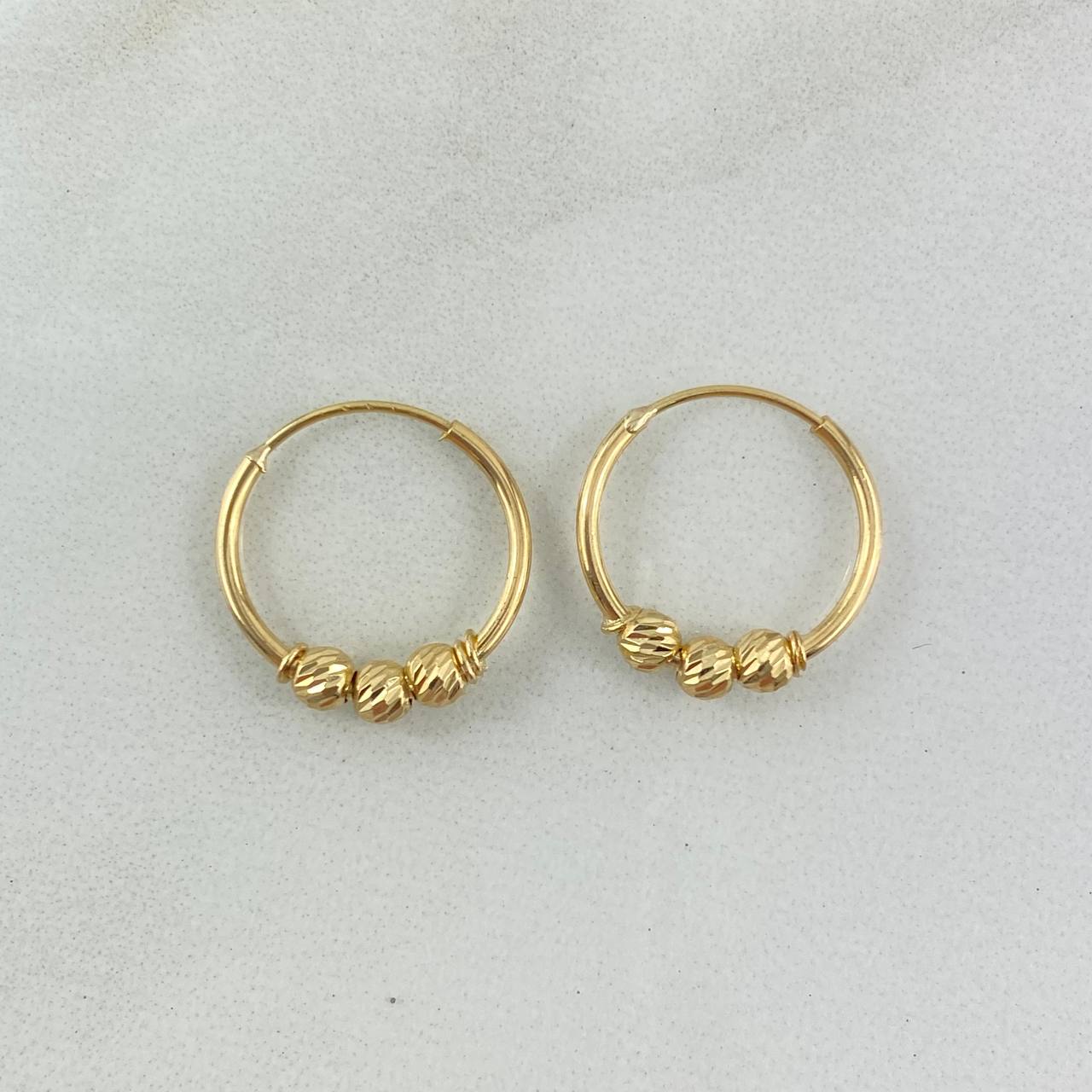 Candongas Aro 1.25gr / 1.5cm / 3mm Bolas Diamantadas Oro Amarillo