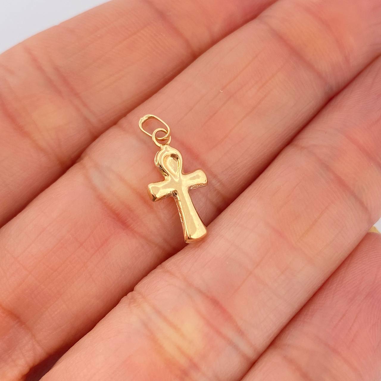 Dije Cruz Egipcia 0.3gr / 2cm / Oro Amarillo 18K $