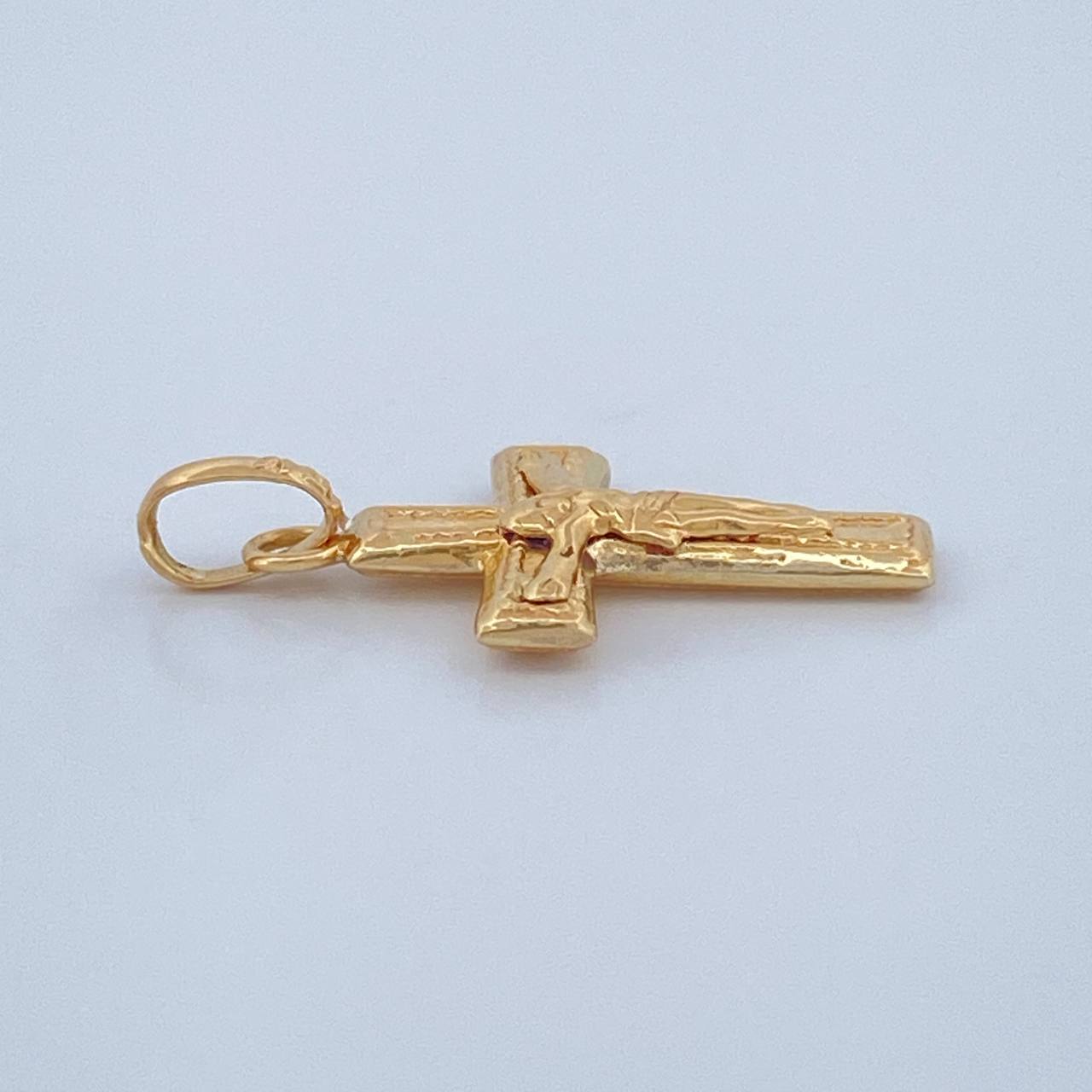 Dije Cruz Cristo 0.5gr / 2.1cm / Oro Amarillo 18K $