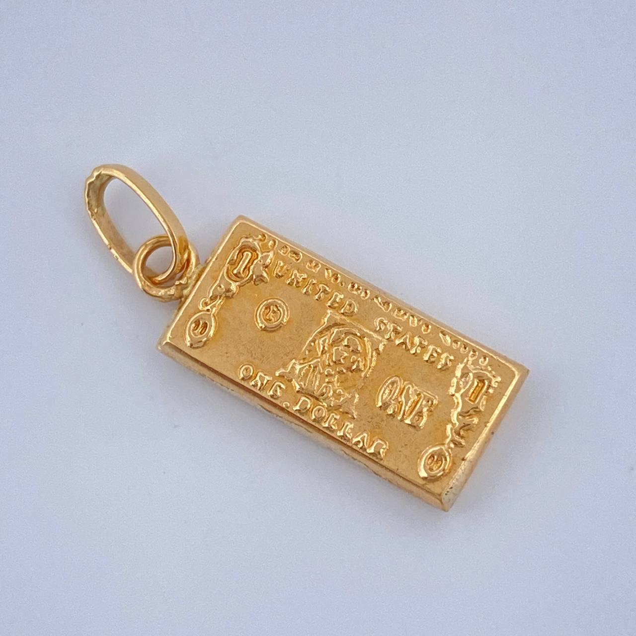 Dije One Dólar 0.55gr / 2cm / Oro Amarillo 18K $
