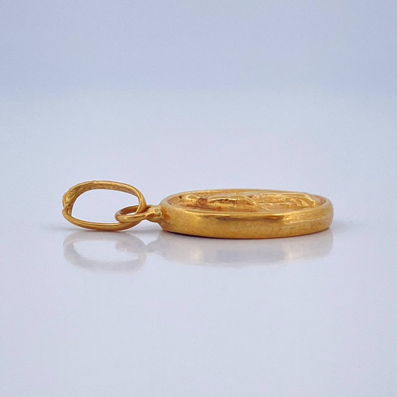 Dije Vigen Milagrosa 0.6gr / 1.9cm / Oro Amarillo 18K &