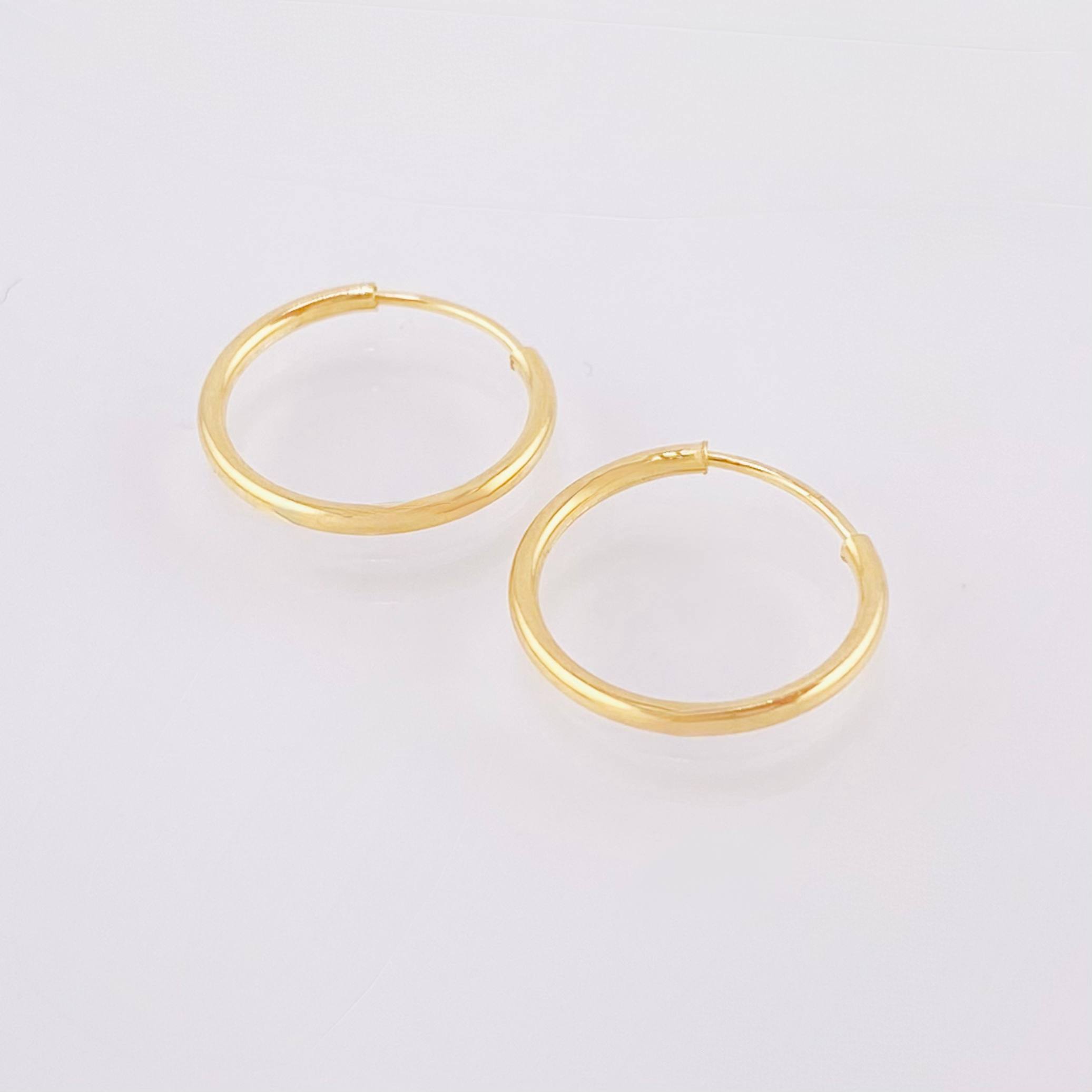 Candongas Mini Aro Liso 0.55gr / 1.3cm / Oro Amarillo 18K