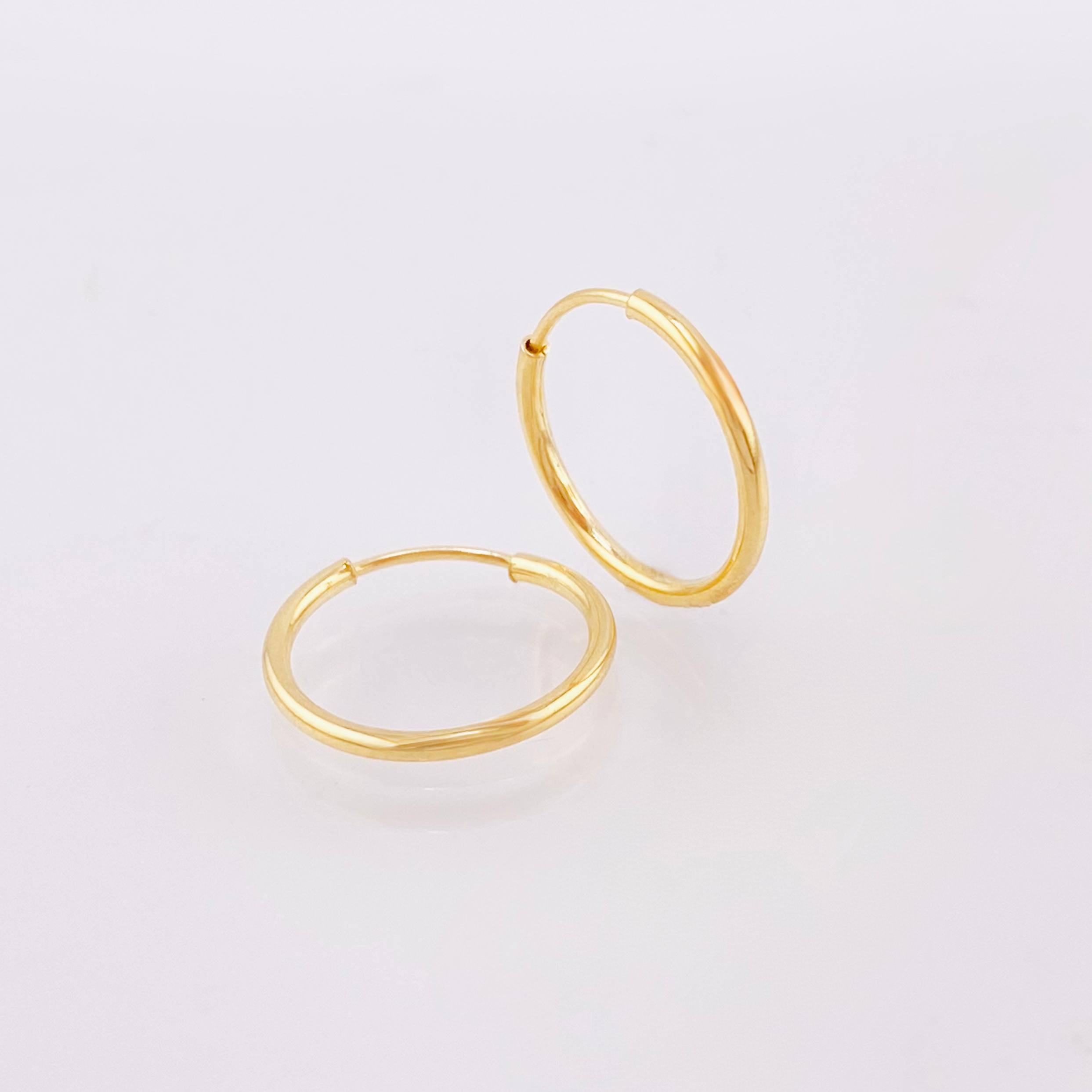 Candongas Mini Aro Liso 0.55gr / 1.3cm / Oro Amarillo 18K