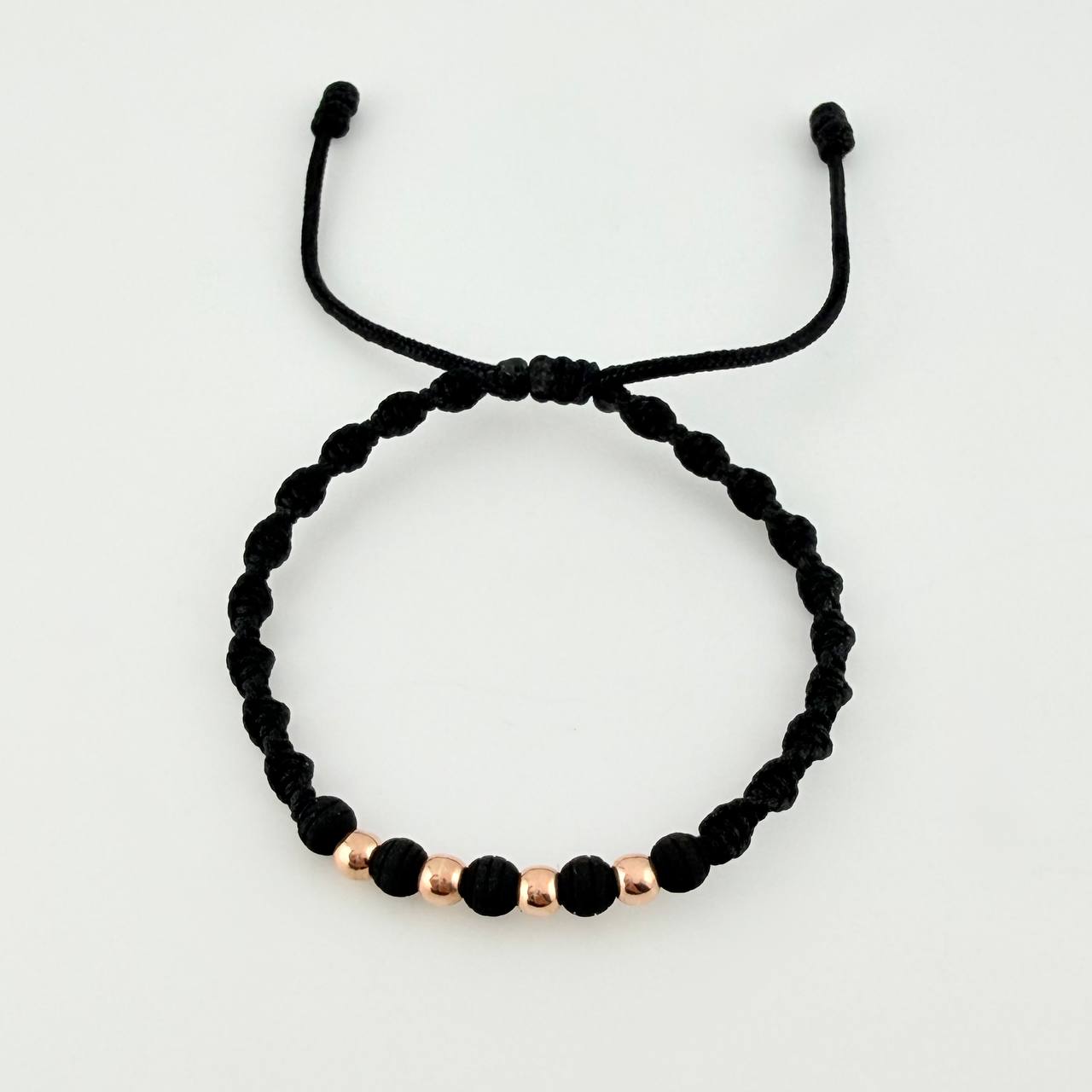 Pulsera Tejida Negra Bolas Lisas Oro Rosa 18K