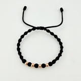 Pulsera Tejida Negra Bolas Lisas Oro Rosa 18K
