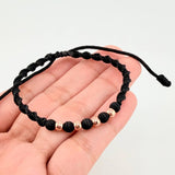 Pulsera Tejida Negra Bolas Lisas Oro Rosa 18K