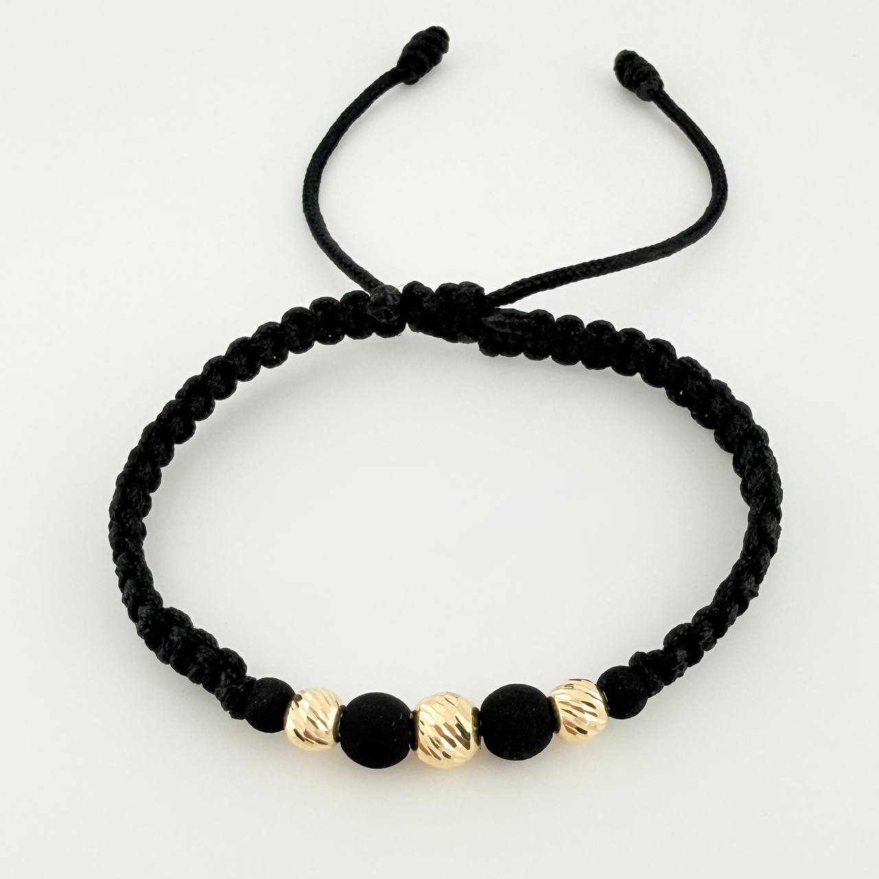 Pulsera Tejida Negra Neoprenos Bolas Diamantadas Oro Amarillo 18K