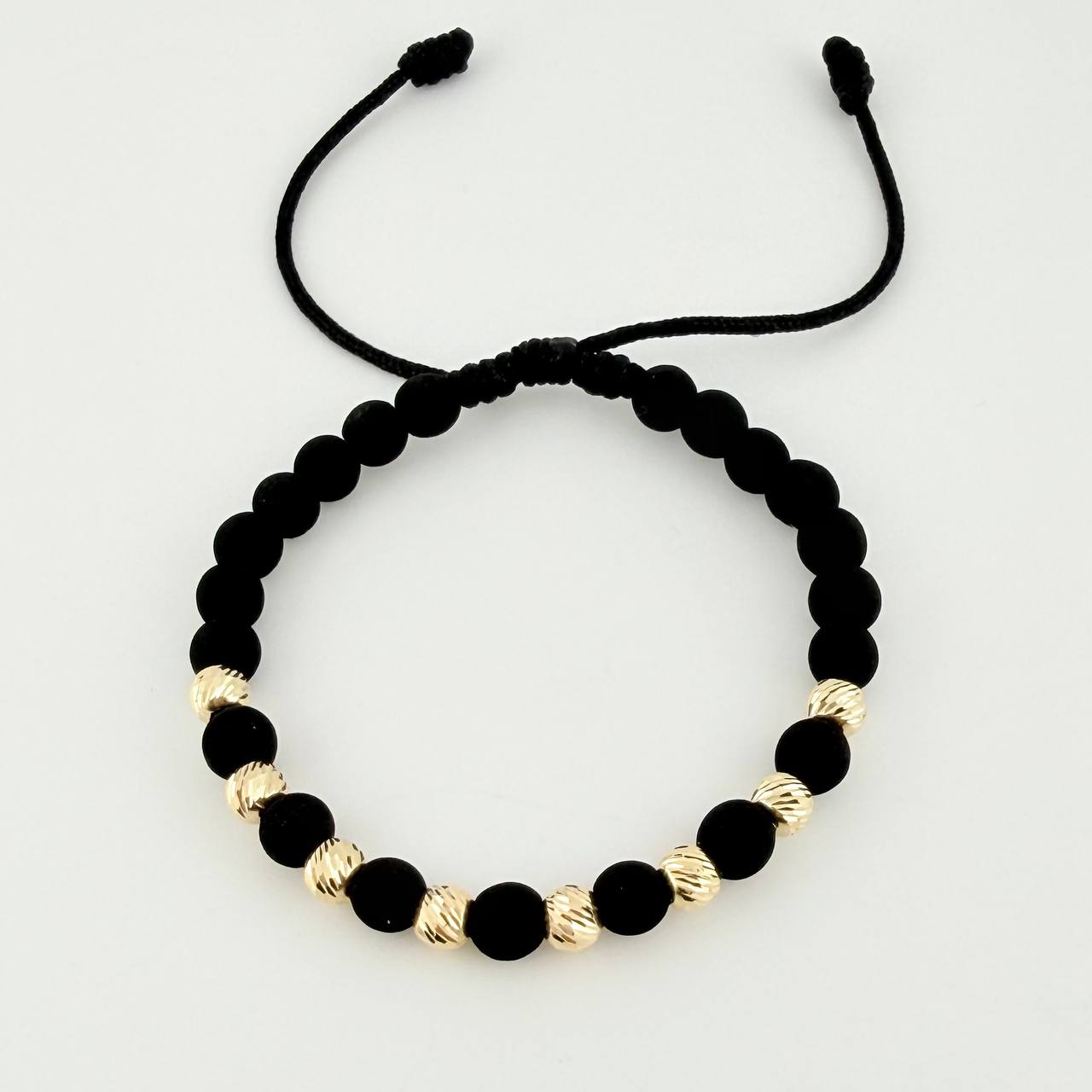 Pulsera Tejida Negra Neoprenos Bolas Diamantadas Oro Amarillo 18K