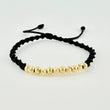 Pulsera Tejida Negra Bolas Diamantadas/ Lisas Oro Amarillo 18K
