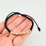 Pulsera Tejida Negra Bolas Diamantadas/ Lisas Oro Amarillo 18K