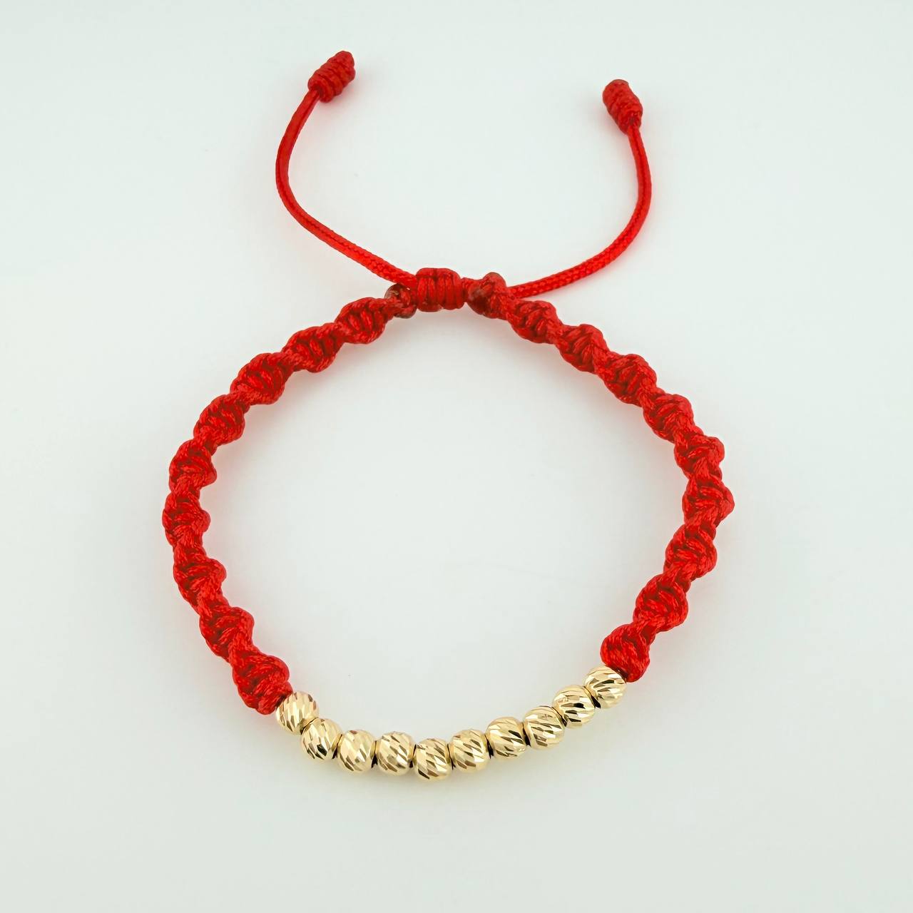 Pulsera Tejida Roja Bolas Diamantadas Oro Amarillo 18K