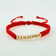 Pulsera Tejida Roja Bolas Lisas Oro Amarillo 18K