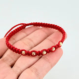 Pulsera Tejida Roja Bolas Diamantadas Oro Amarillo 18K
